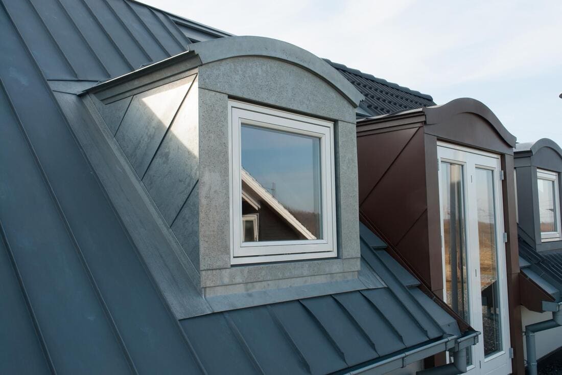Roof metal detail near a low-slope surface